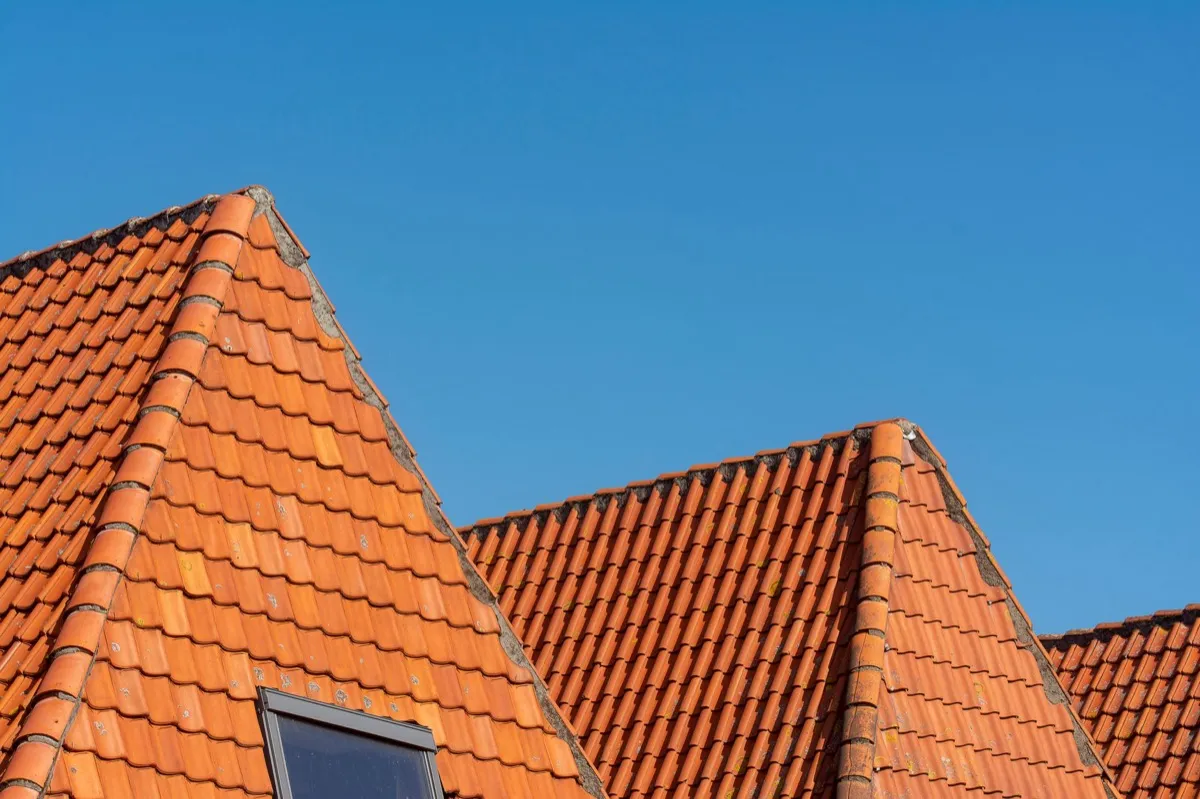 Clay barrel tile rooflines on homes in St. Cloud, MN
